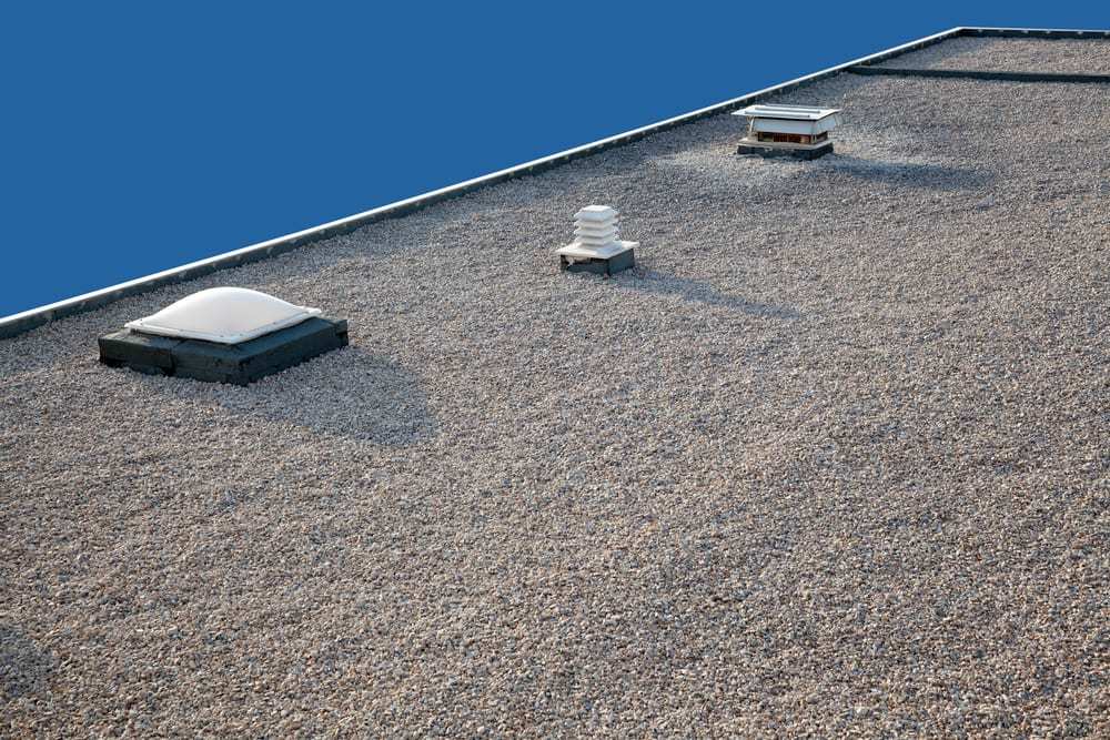 Gravel Commercial Roof with Skylight, Close-up