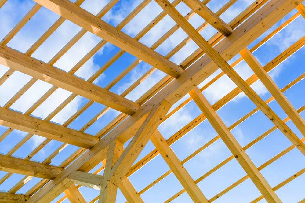 Wooden roof construction, blue sky
