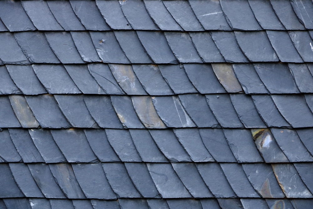 Aged slate roof tiles close-up