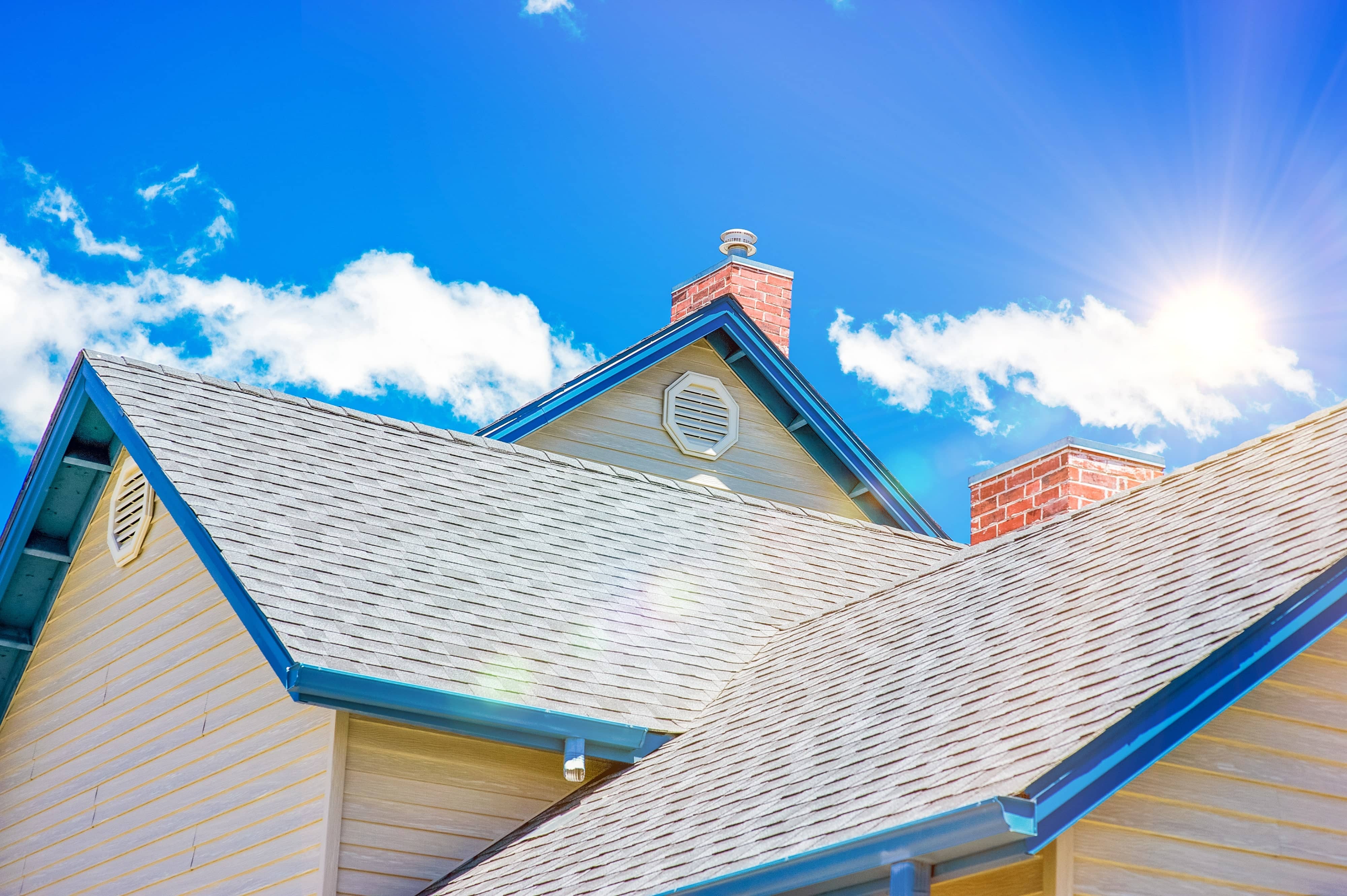 Roof of house, blue sky